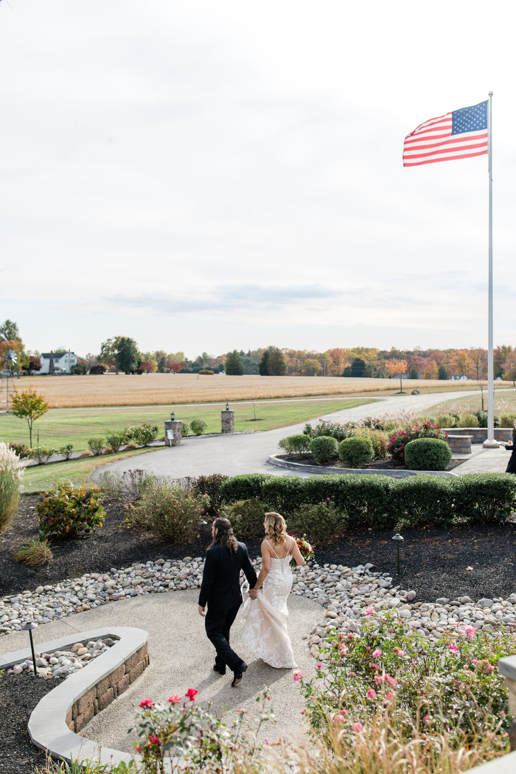 Bride and groom walking at Rosewood Farm