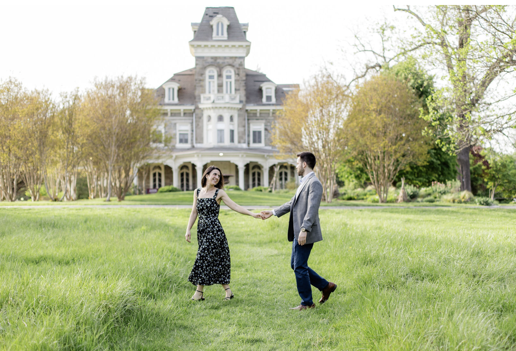 Cylburn Arboretum photoshoot location Baltimore maternity couple walking in field