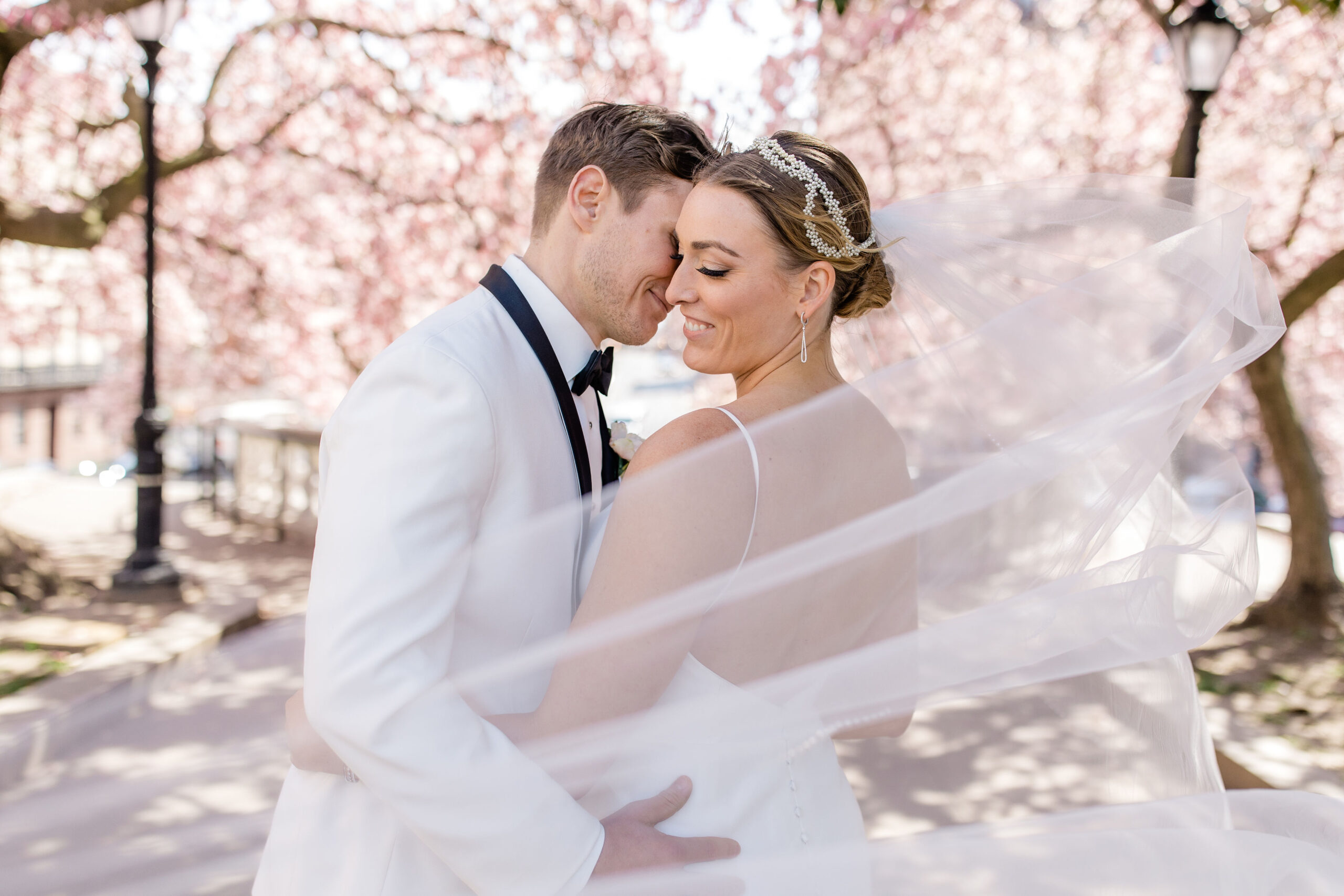 Mount Vernon Baltimore photoshoot location romantic bride and groom veil moment