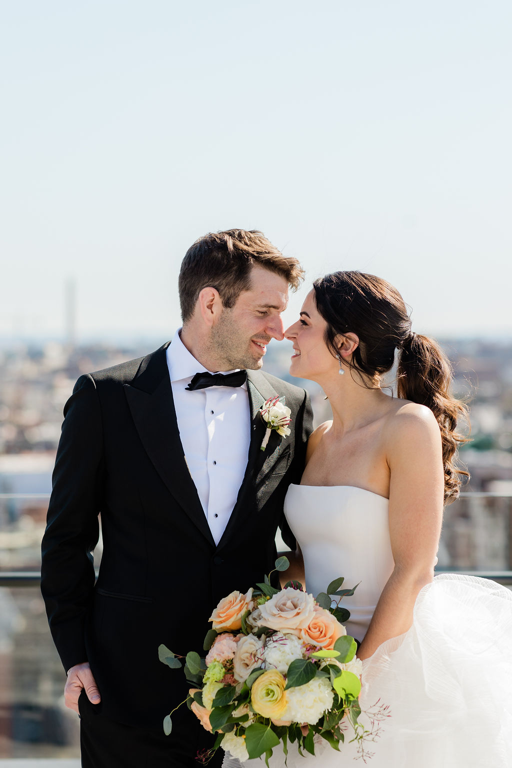 romantic rooftop portrait of bride and groom during a wedding in washington dc