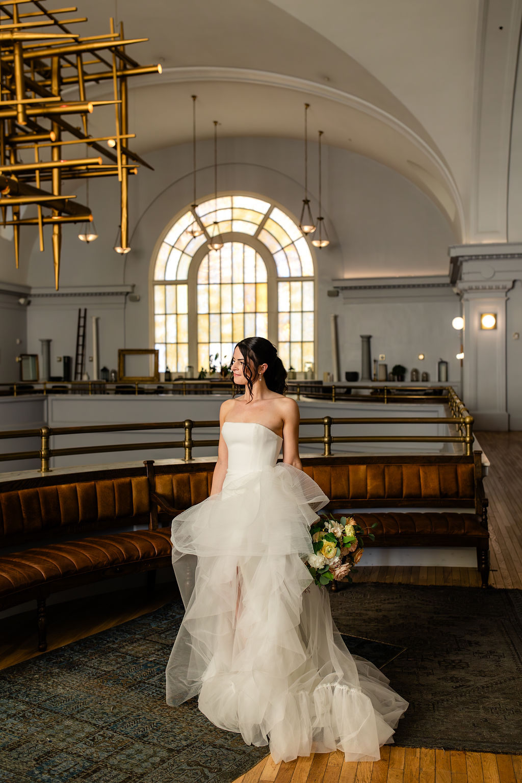 bridal portrait holding peach and ivory bouquet 