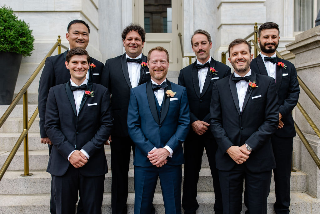 groom and groomsmen portraits on classic washington dc steps with black tuxedos