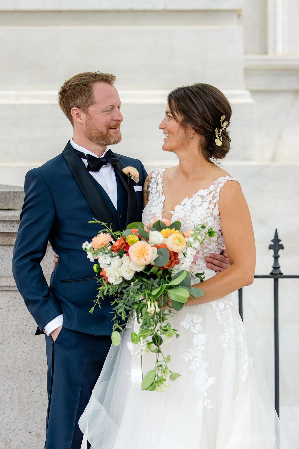 bride and groom portraits outdoors with soft natural light and floral bouquet