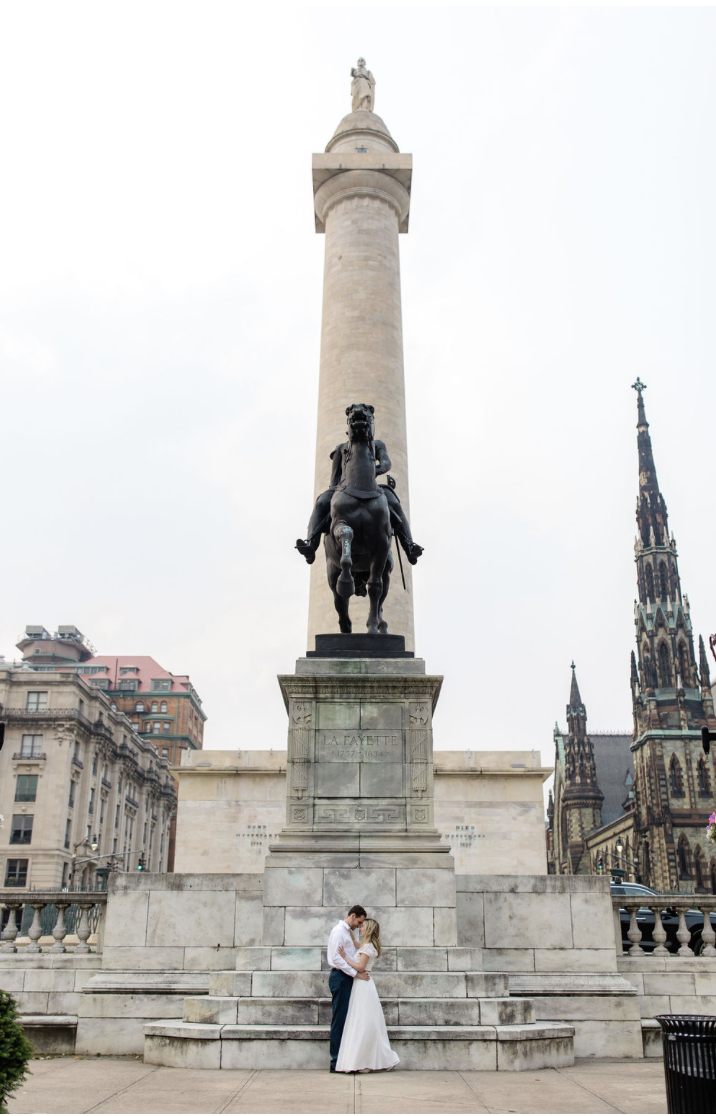 Mount Vernon Baltimore engagement photos with historic monument architecture and timeless city scenery