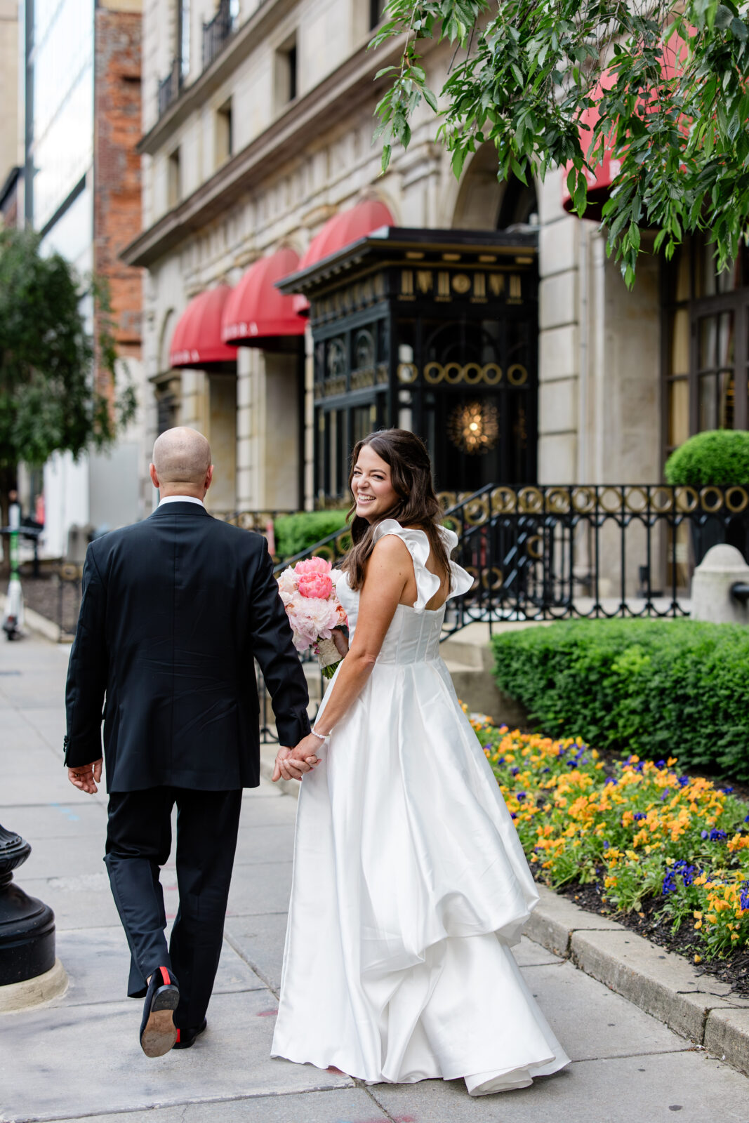 bride and groom potrait outside the st. regis washington dc