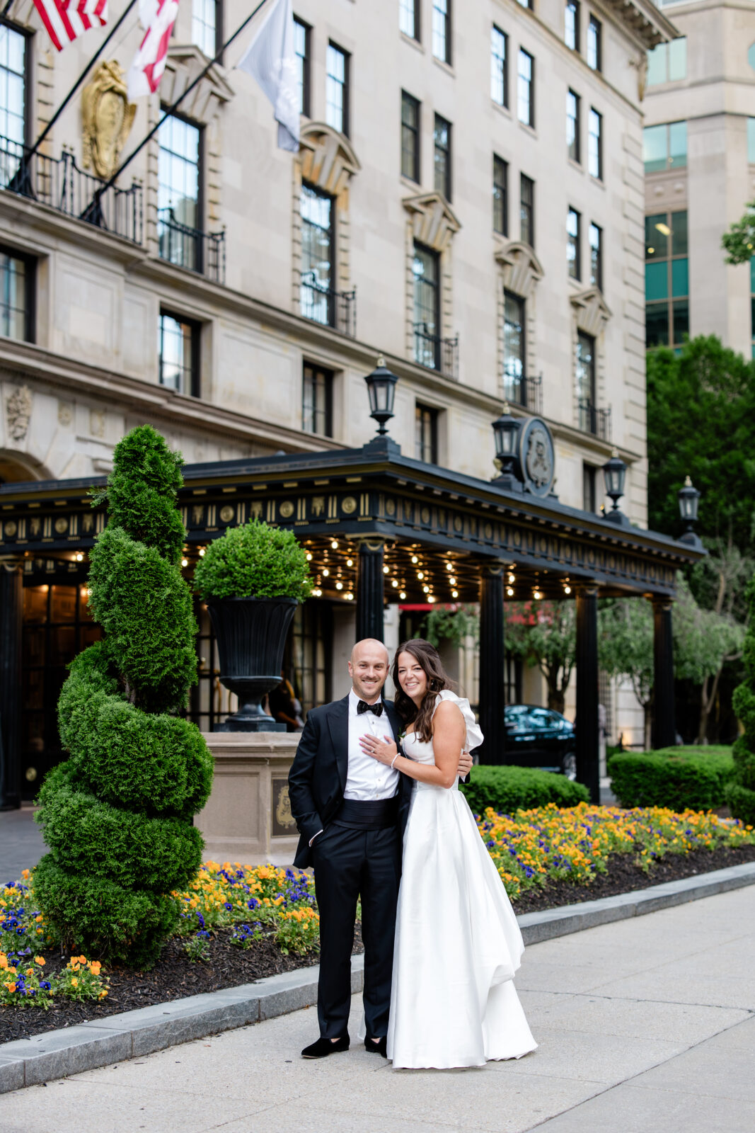 bride and groom potrait outside the st. regis washington dc wedding venue