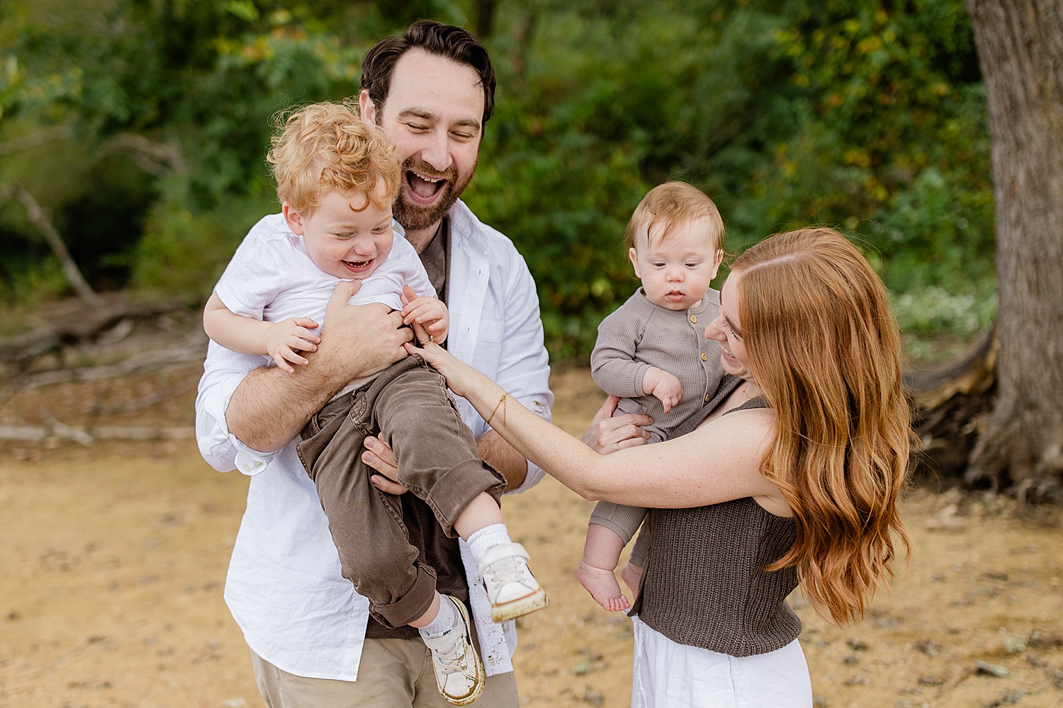 mom and dad tickle kiddos by Jen Harvey Photography
