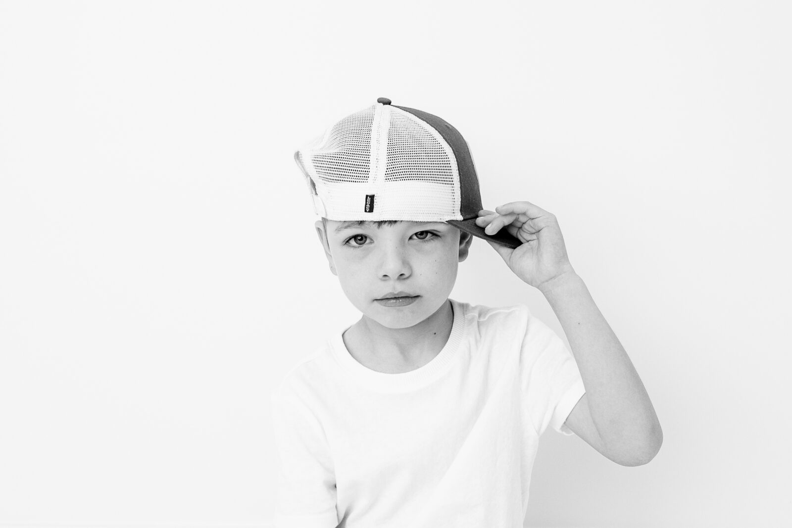 Black and white personality portrait of an elementary-age child, Baltimore studio