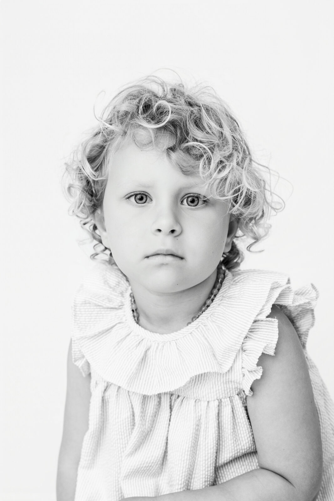Black and white personality portrait of an elementary-age child, Baltimore studio