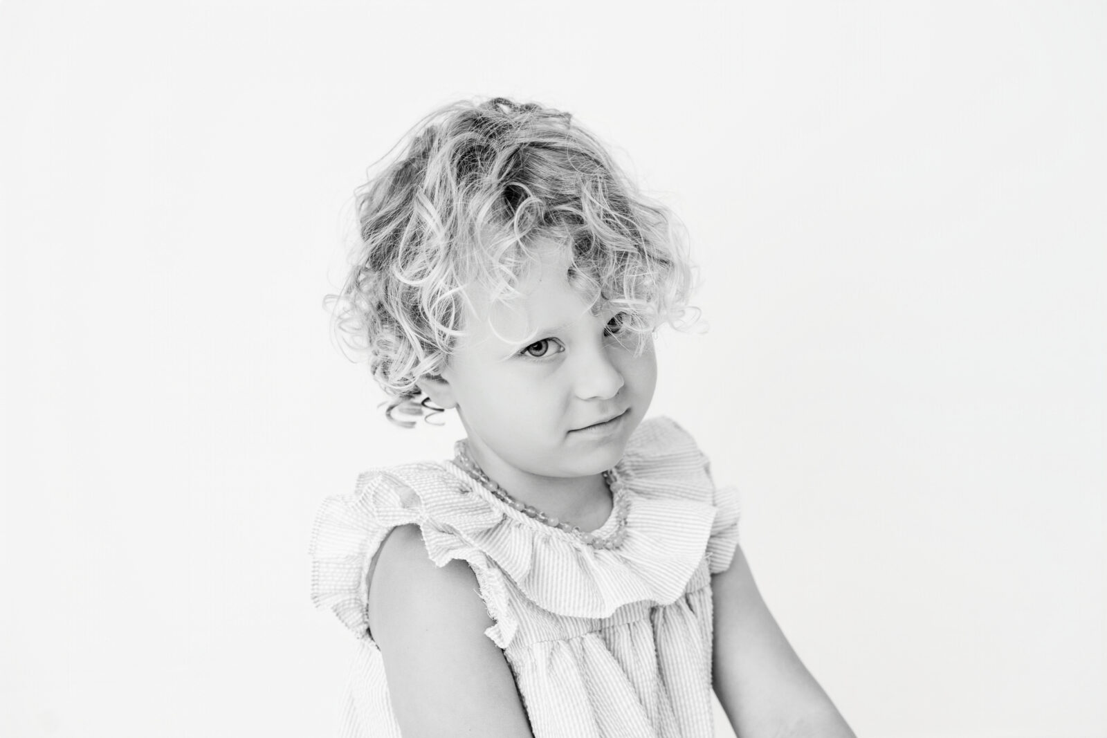 Black and white personality portrait of an elementary-age child, Baltimore studio