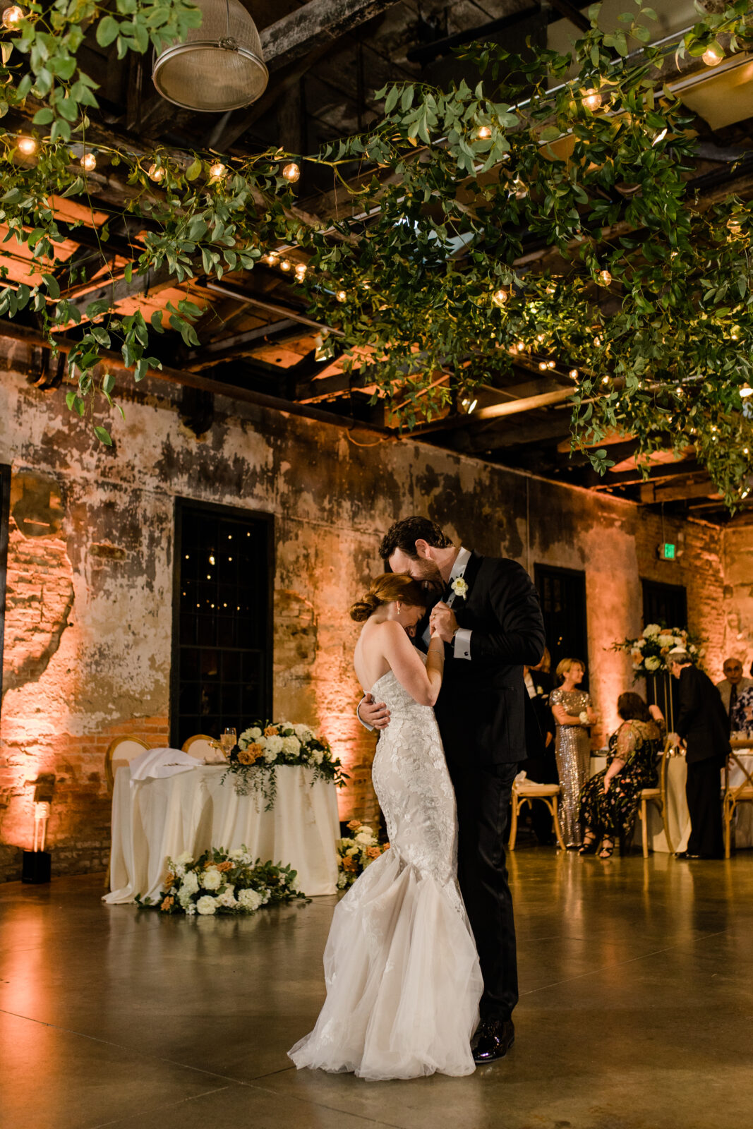 A bride and groom dancing during their wedding reception captured by a Baltimore family photographer.