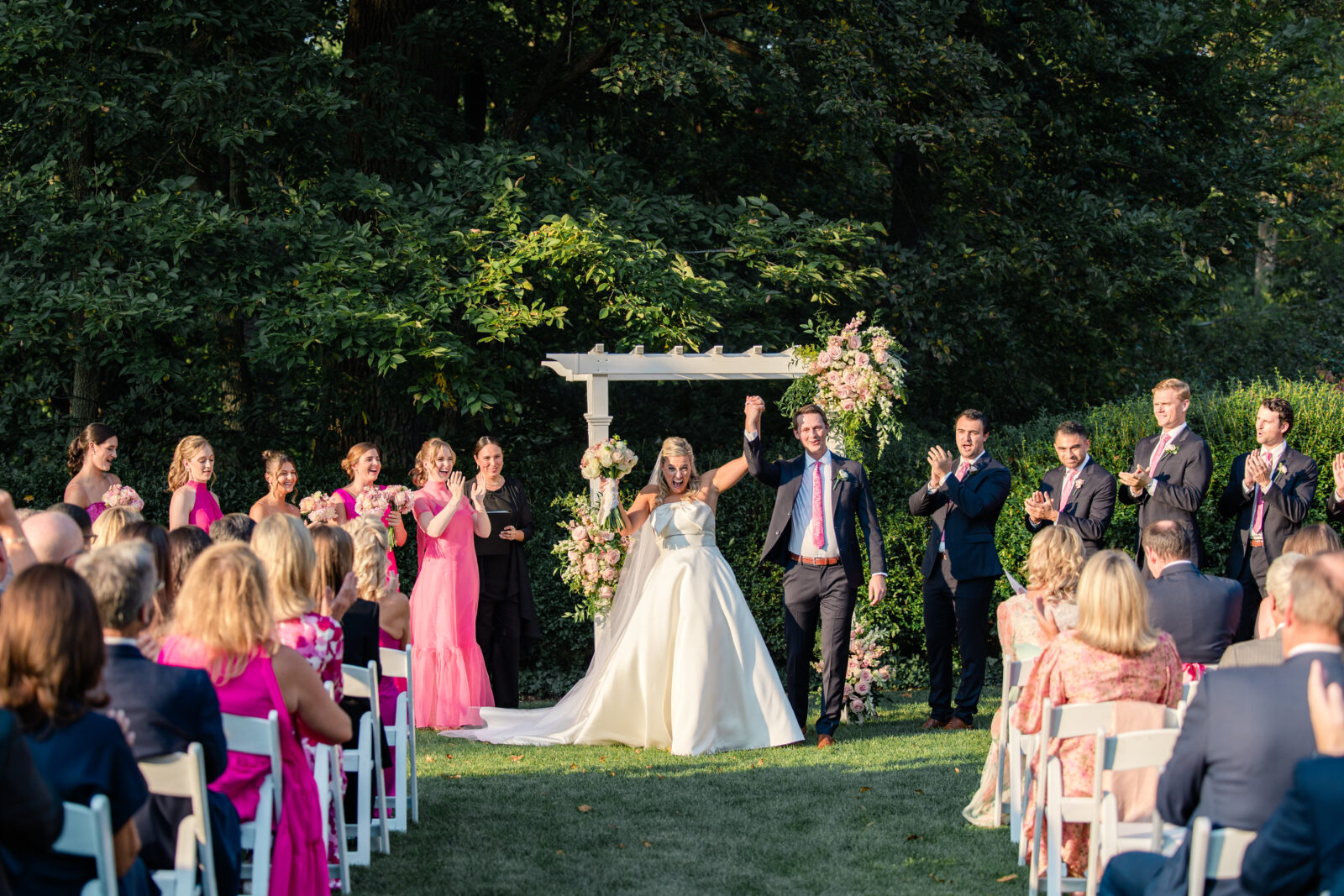 happy bride and groom celebrate during the ceremony