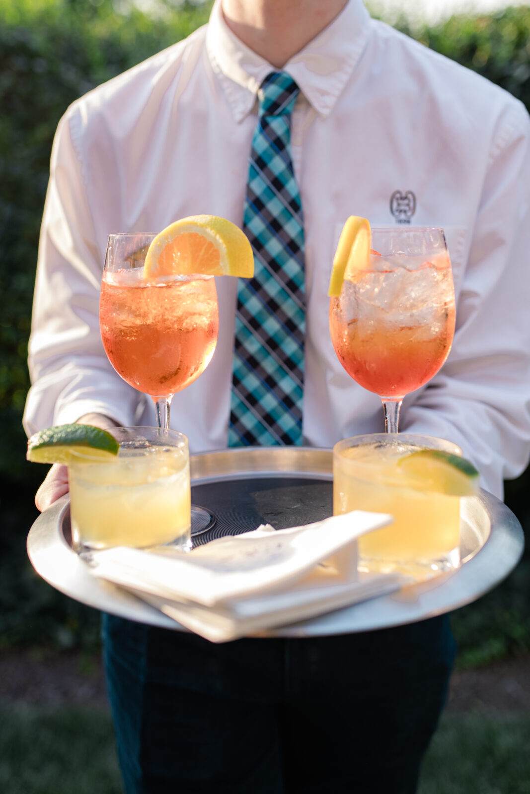 waiter serving cocktails during the wedding reception