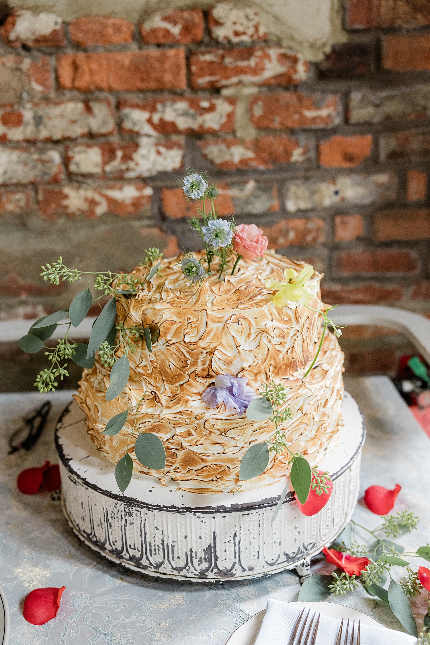 two tier cake on stand at Woodberry Kitchen