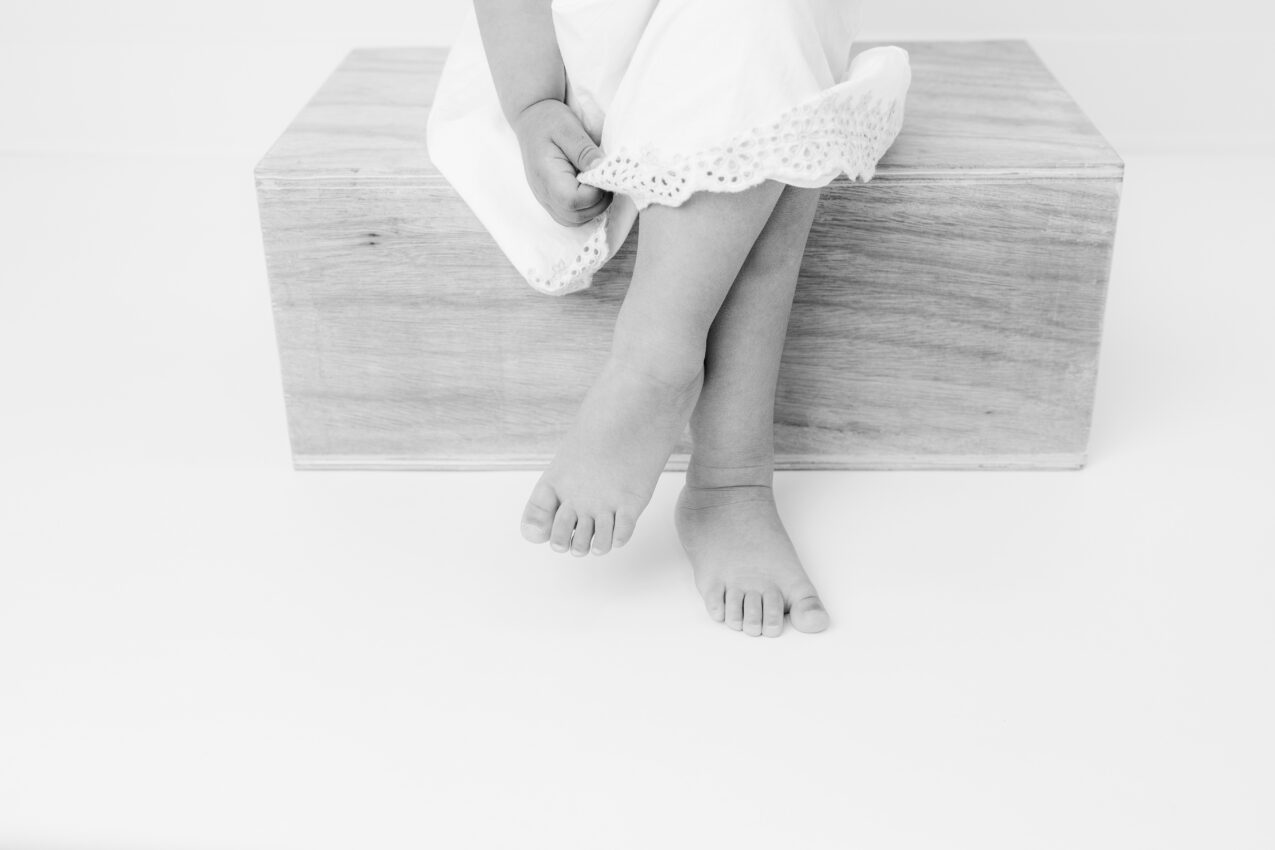 black and white photo showing details during a Little Whimsy Potrait Co. personality photo session