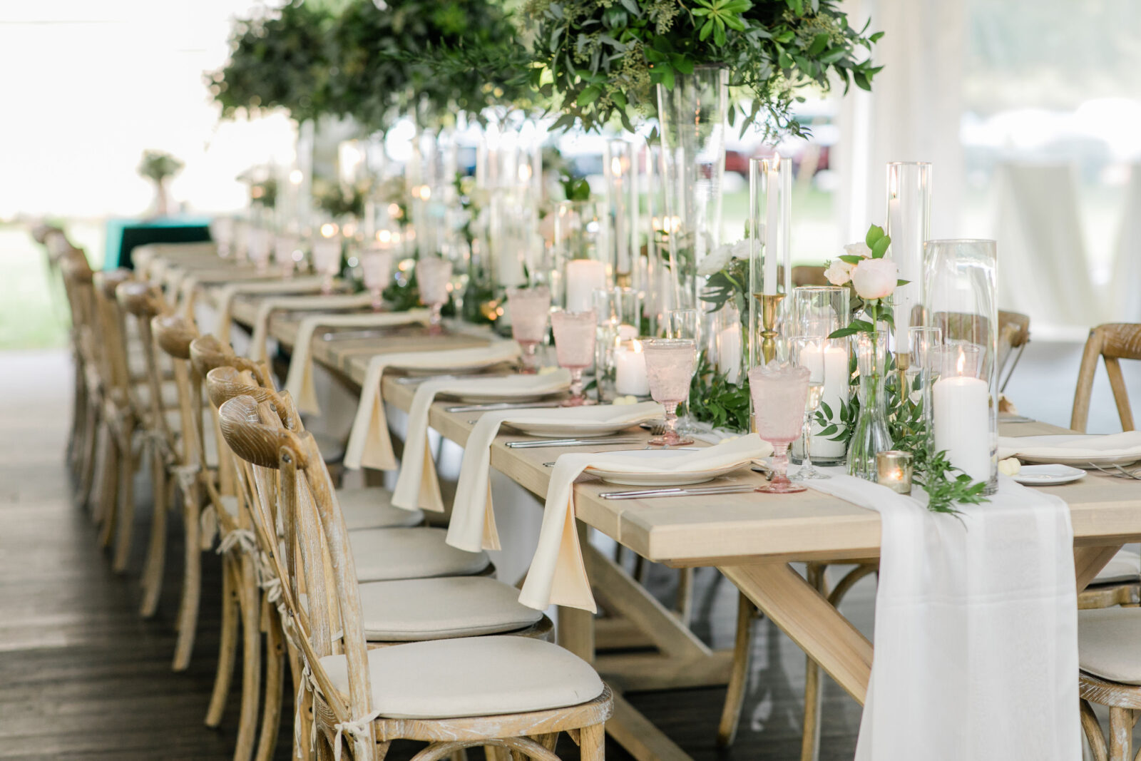 Reception table decorated with florals and napkins