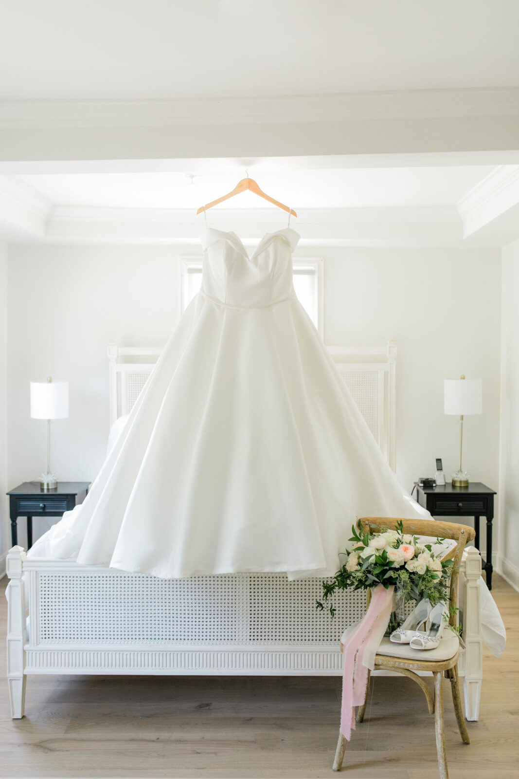Wedding gown hanging in the bridal suite