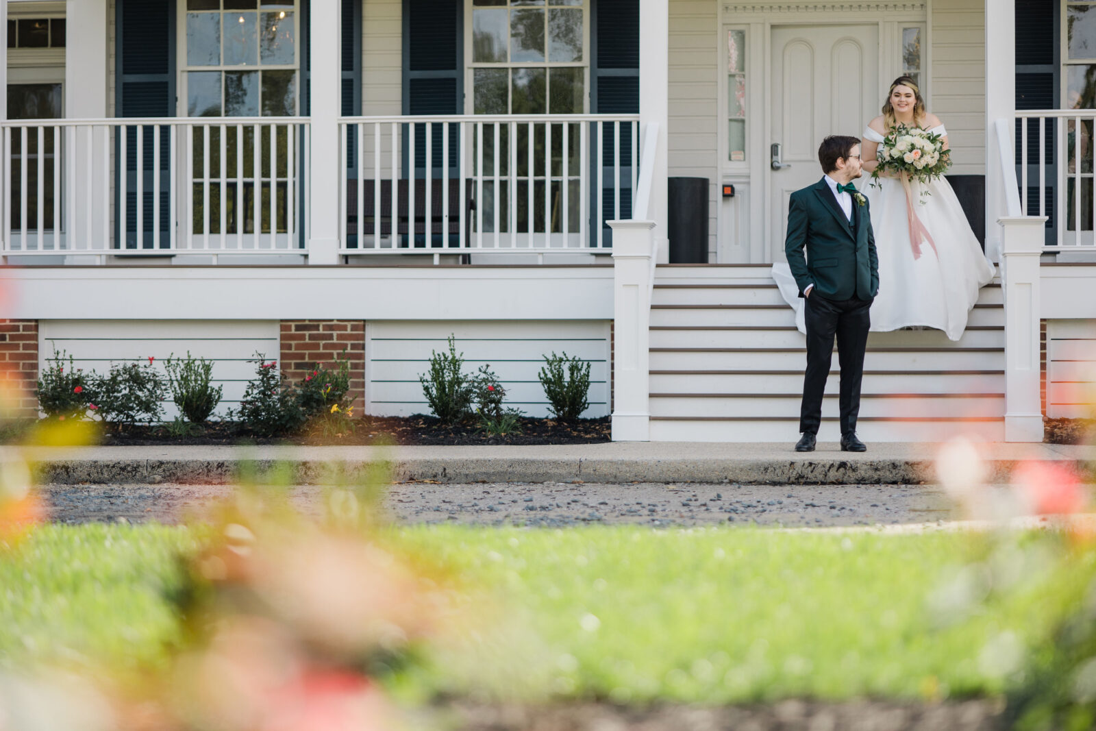 Bride and groom doing a first look in front of Kent Island Resort wedding venue