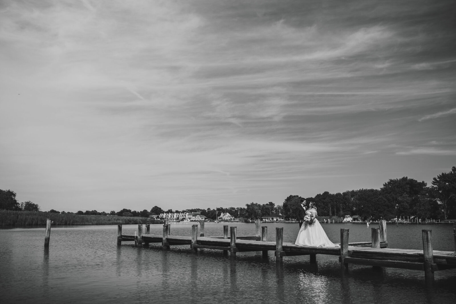 Bride and groom portrait on the dock at the Kent Island Resort
