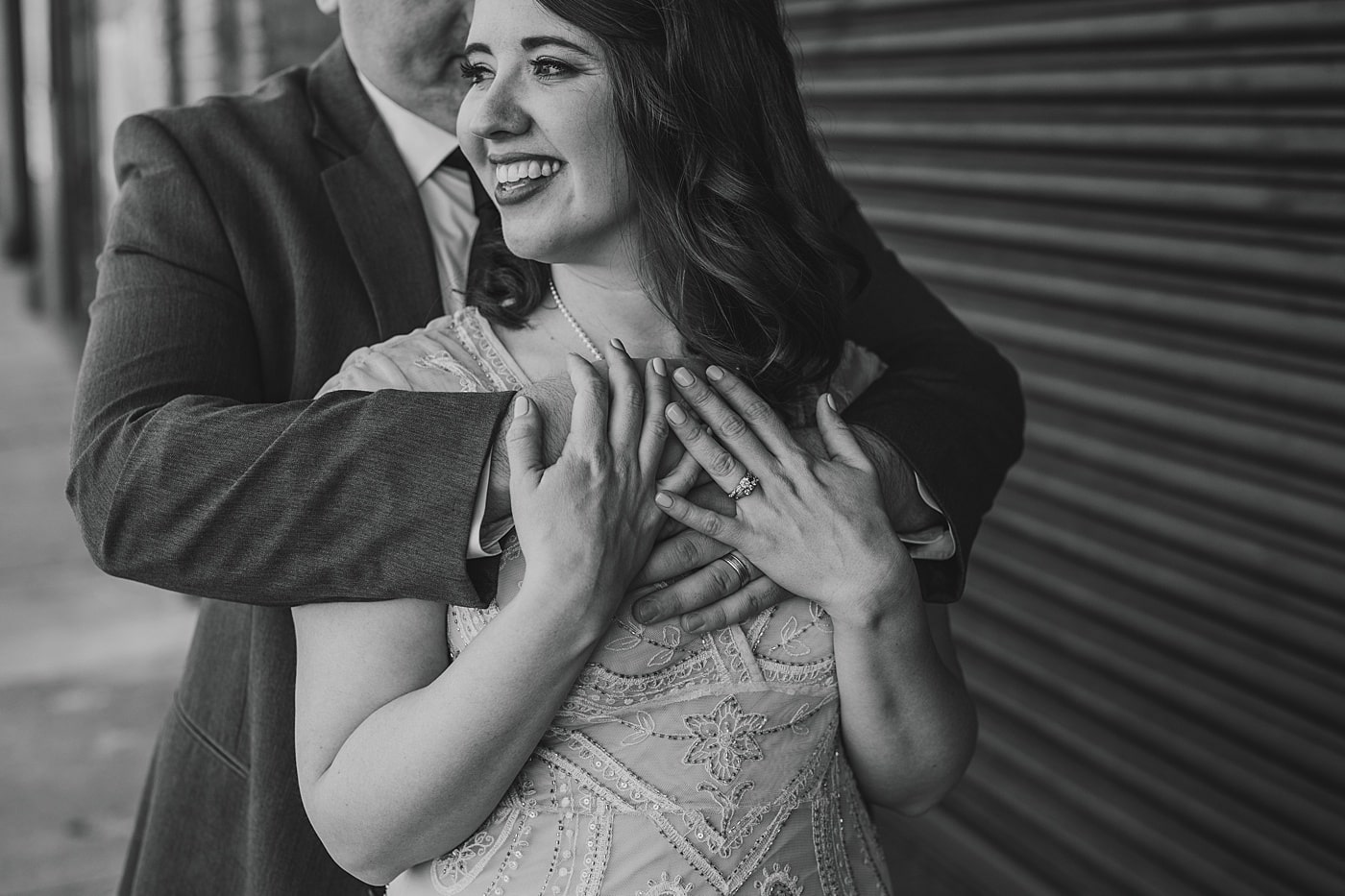 Moody black and white bride and groom portrait