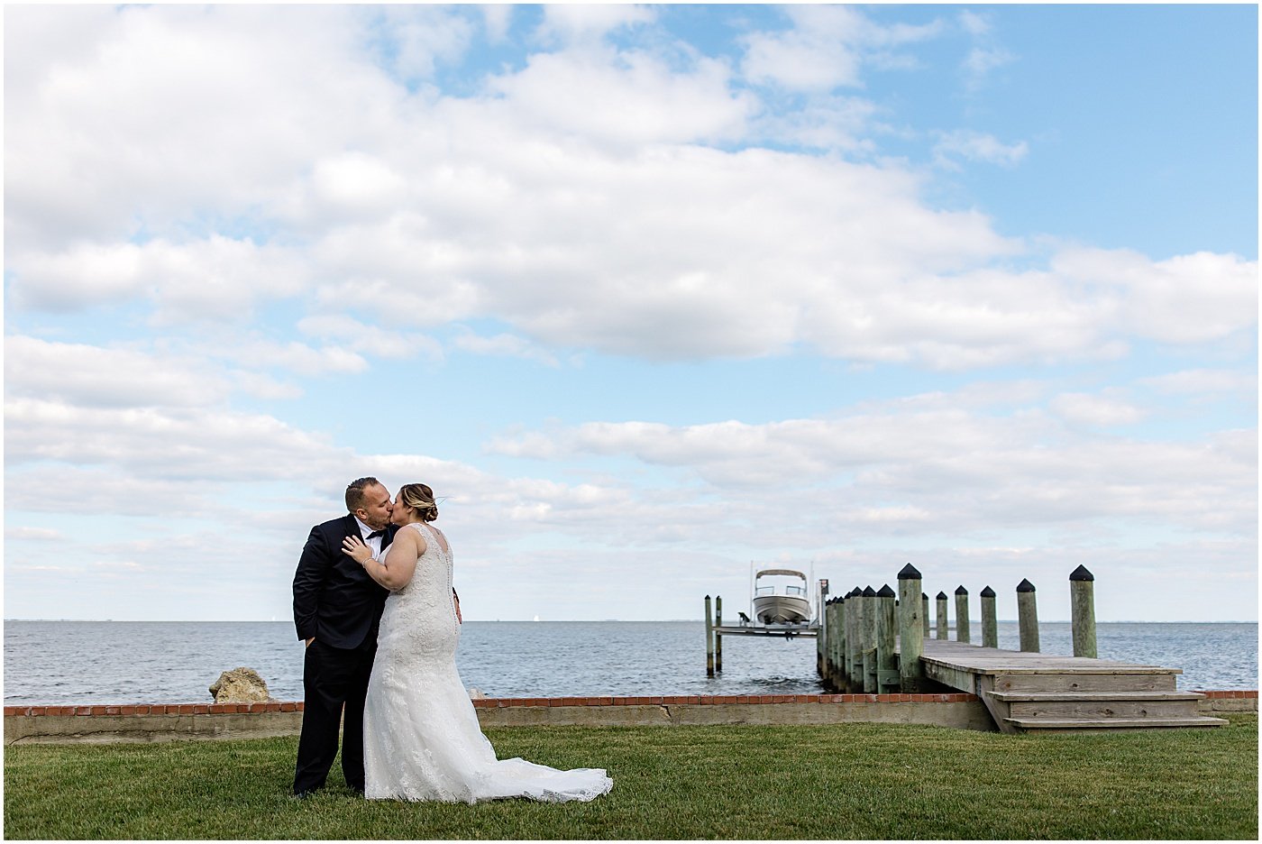 bride and groom embracing during first look at Celebrations at the Bay
